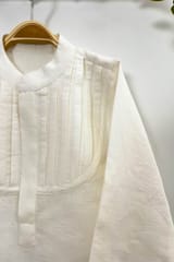 Off-white linen kurta with pleated front yoke